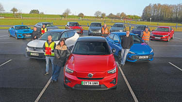Auto Express team members standing with a selection of cars